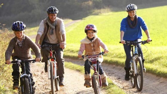 Family riding bikes together