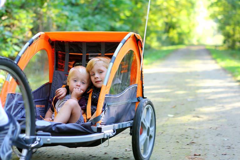 baby in bike trailer